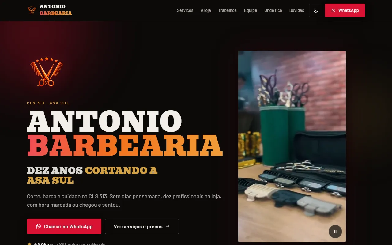 Página da Antonio Barbearia: nome em letras condensadas brancas e laranja sobre fundo preto, ao lado de um vídeo do barbeiro trabalhando.